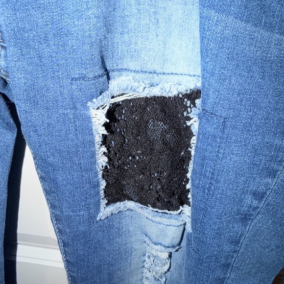 Distressed Light Blue Women’s Jeans with Black Patch Details - Picture 2 of 3